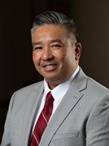 Headshot of Butch de Castro