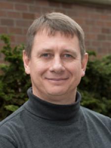 Headshot of Christopher D. Simpson